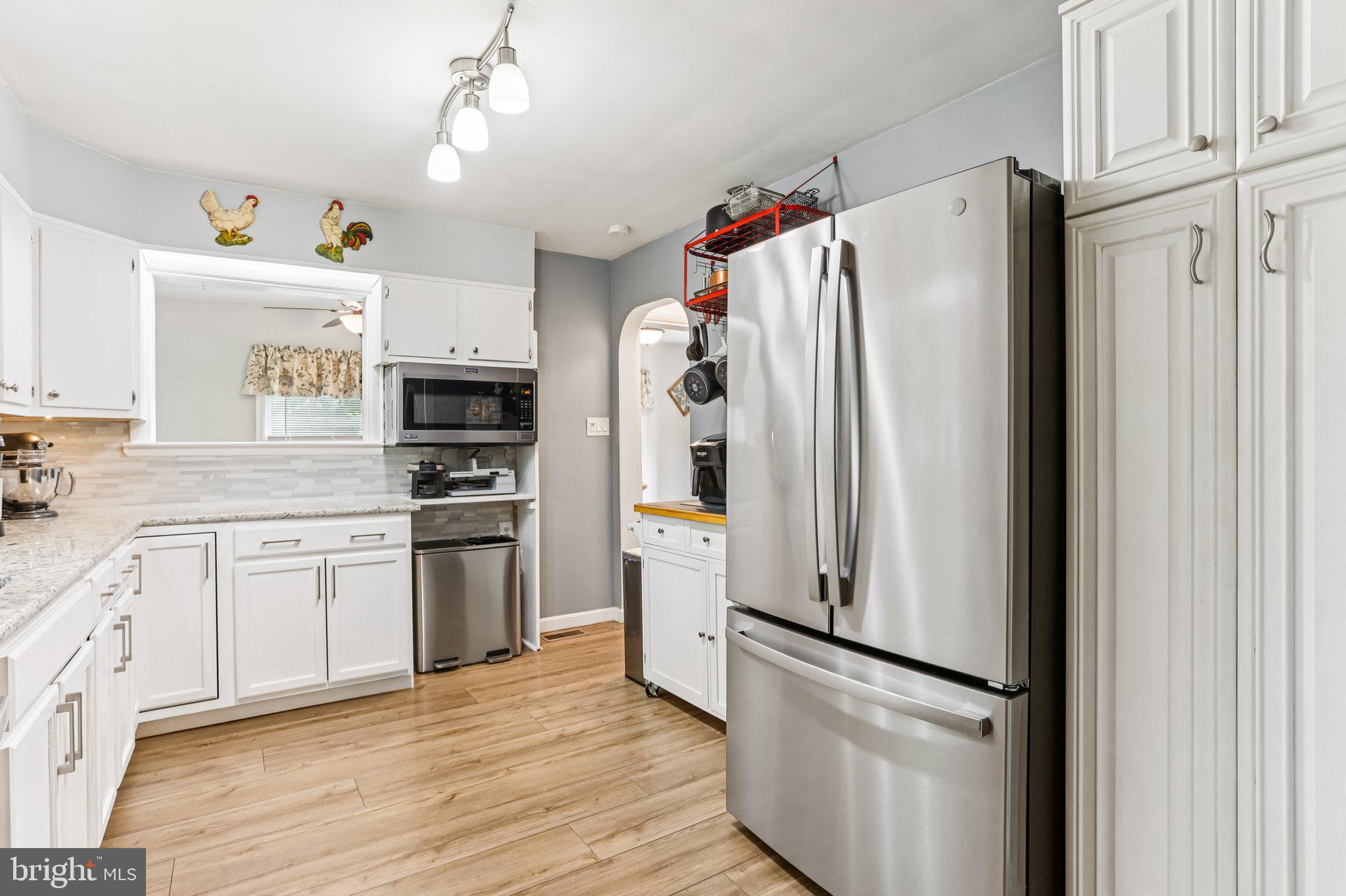 156 Valleyview Drive Exton, PA 19341 - Photo 10 of 26 a kitchen with stainless steel appliances a refrigerator sink and microwave