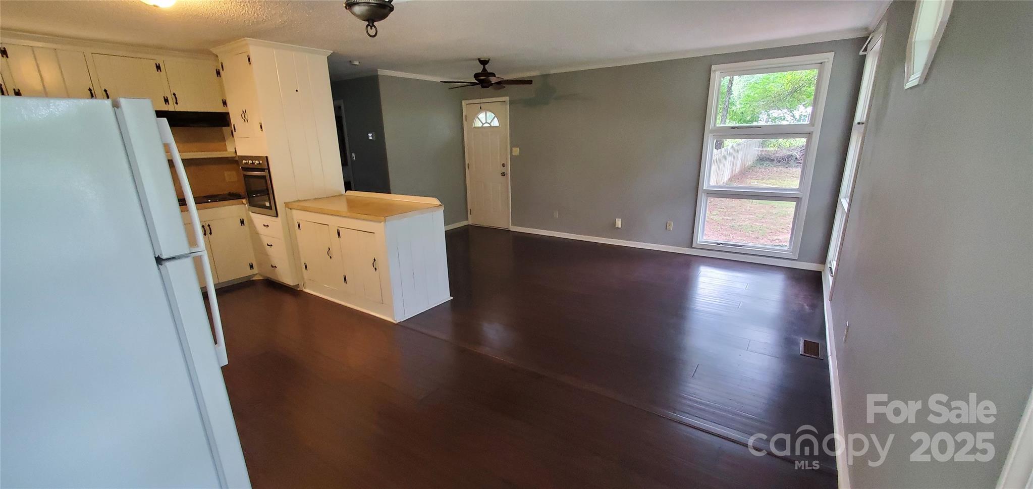 124 Roxie Lane Belmont, NC 28012 - Photo 2 of 6 a view of a kitchen from the hallway