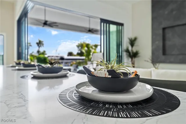 a dining room with furniture a livingroom and chandelier