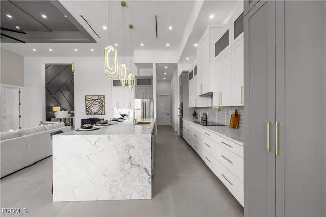 a kitchen with a sink and cabinets