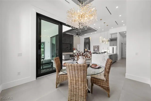 a bed room with a bed and a ceiling fan