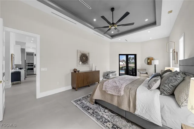 a bedroom with a bed and a desk