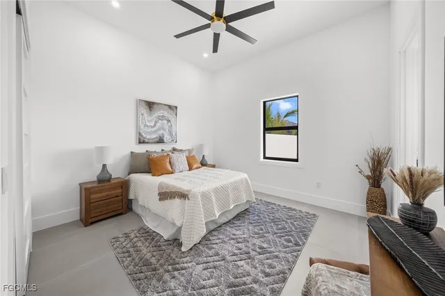a view of a patio with swimming pool table and chairs