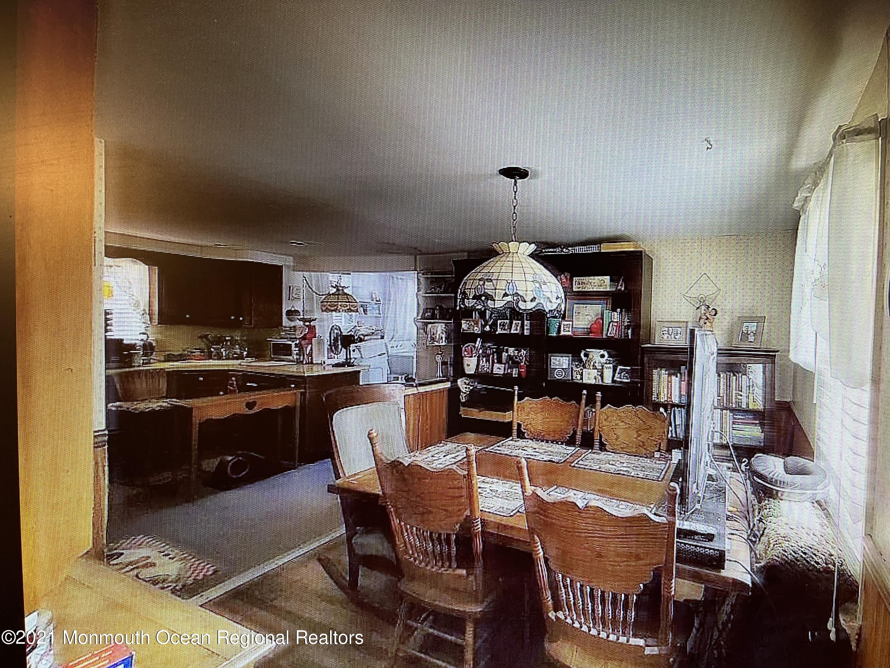 803 Wall Road Spring Lake Heights, NJ 07762 - Photo 3 of 9 a view of a dining room with furniture