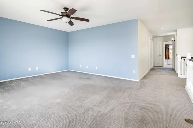 a view of a big room with carpet