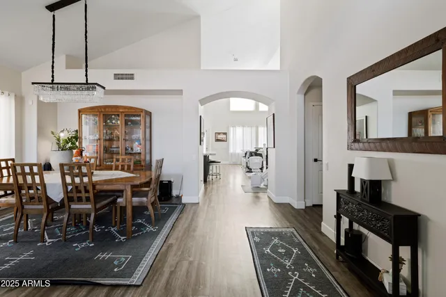 a view of a living room and dining room