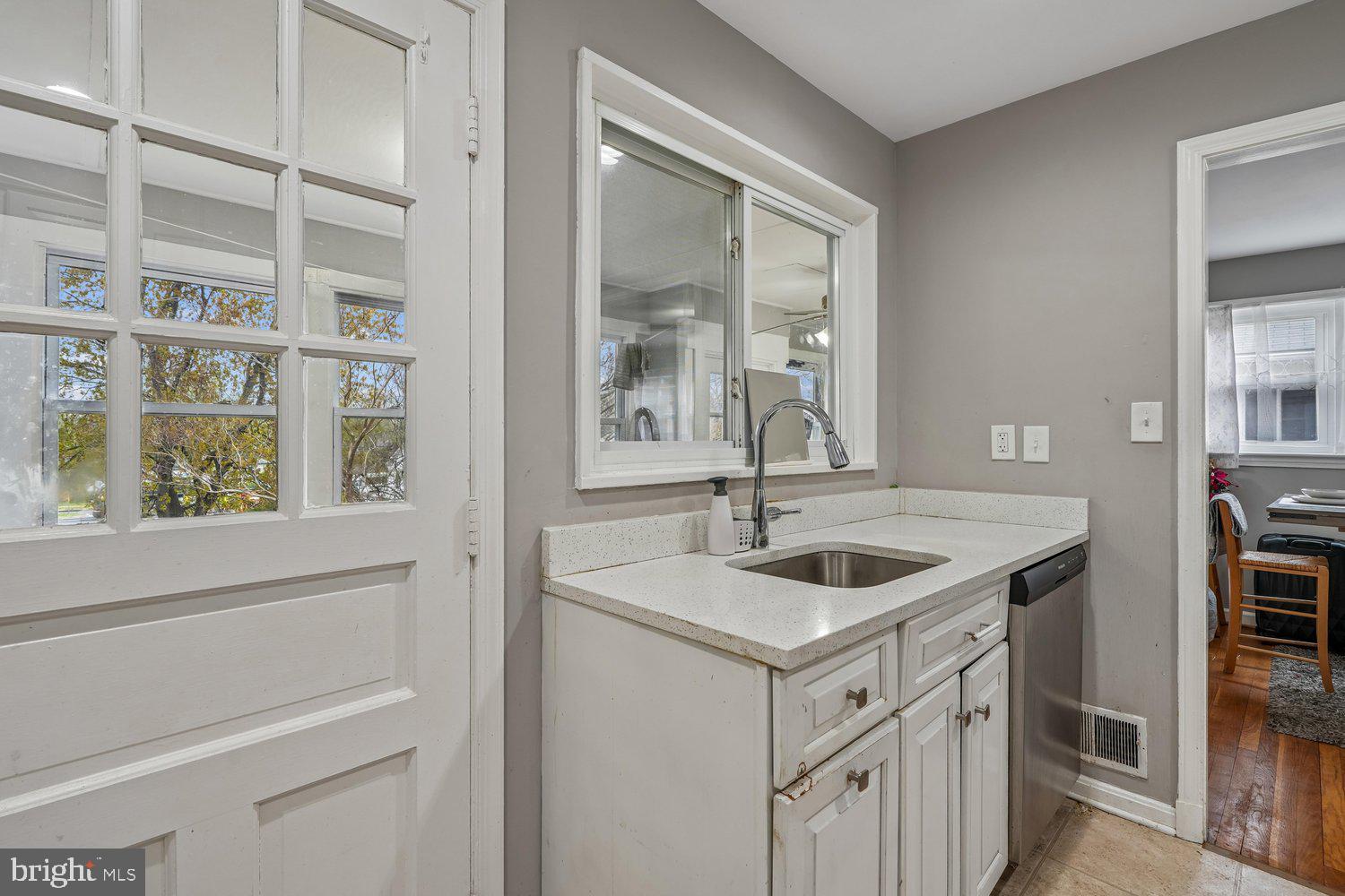 10128 Dallas Avenue Silver Spring, MD 20901 - Photo 11 of 29 a bathroom with a sink and a mirror