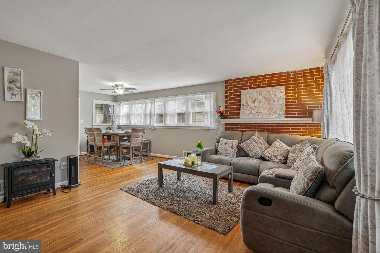 10128 Dallas Avenue Silver Spring, MD 20901 - Photo 2 of 29 a living room with furniture and wooden floor