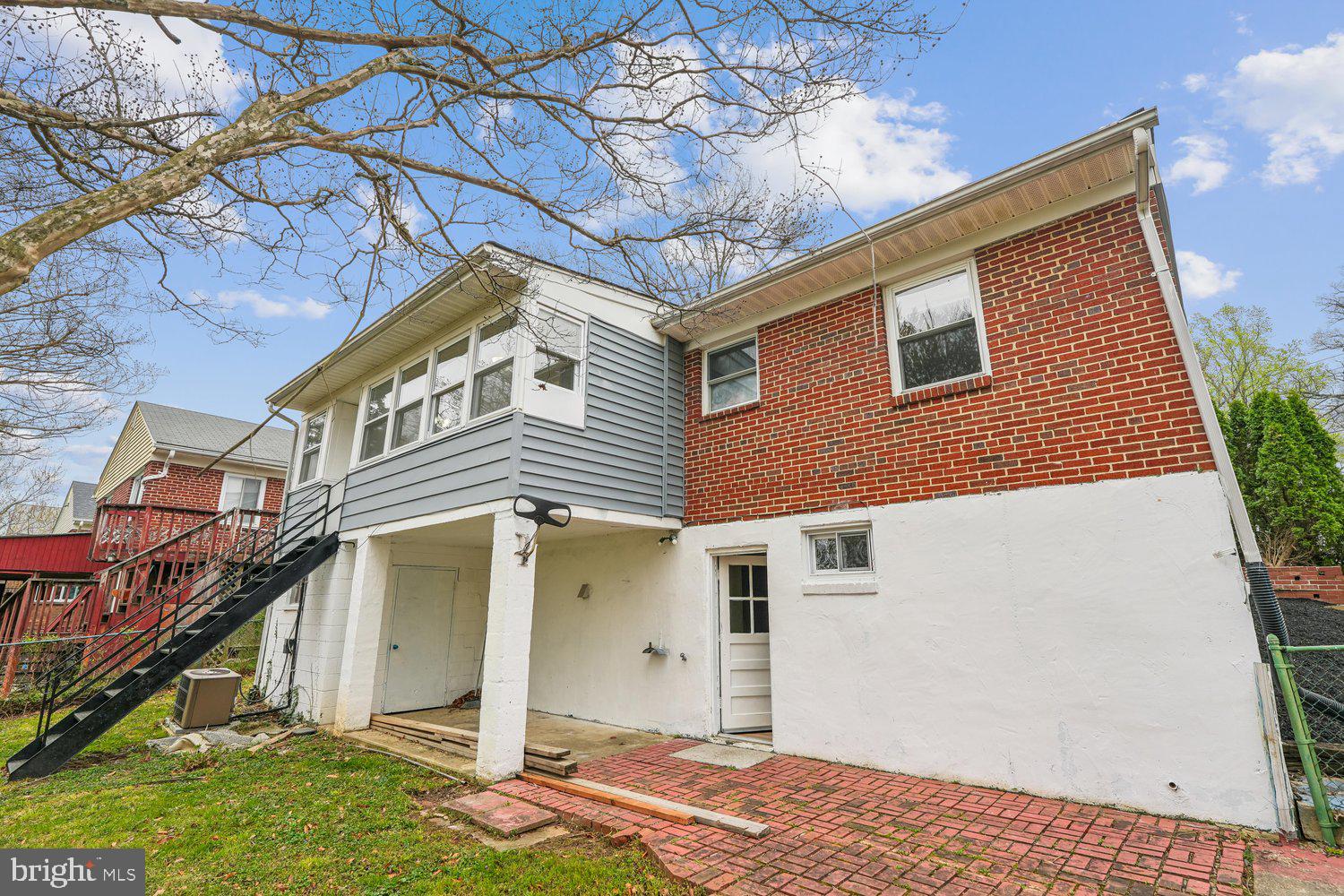 10128 Dallas Avenue Silver Spring, MD 20901 - Photo 28 of 29 a view of a house with a yard