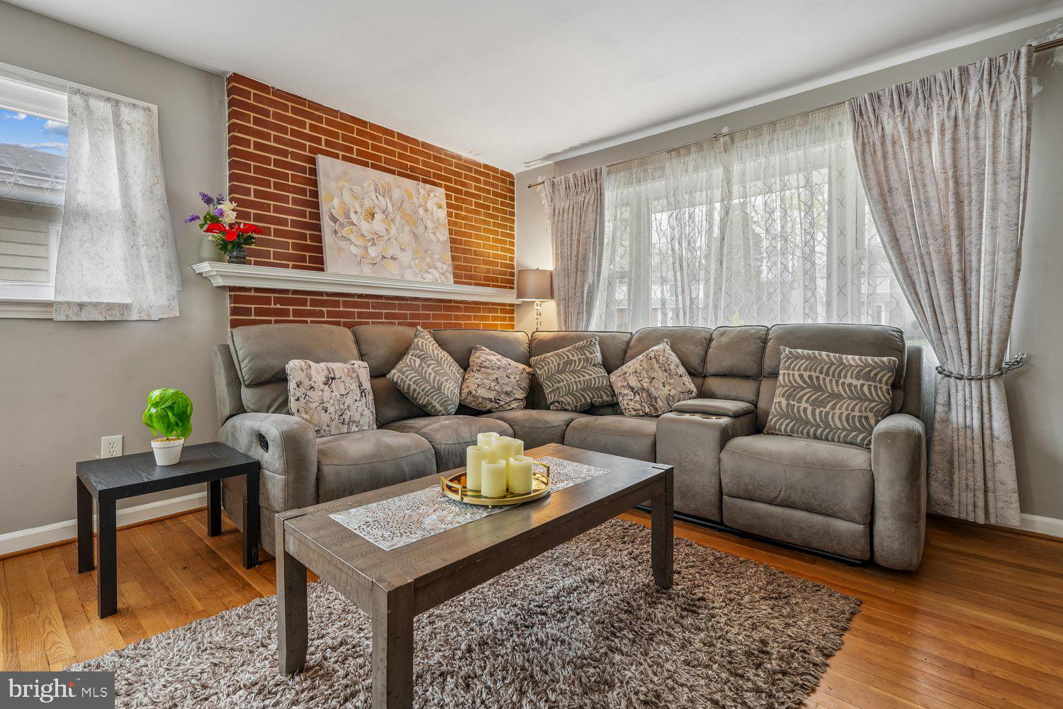 10128 Dallas Avenue Silver Spring, MD 20901 - Photo 4 of 29 a living room with furniture and a window