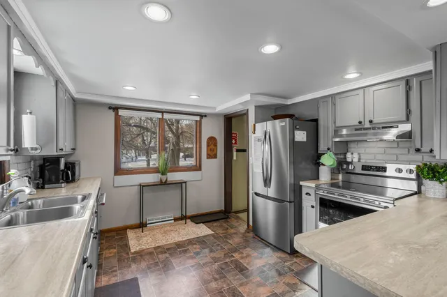 $450,000 | 1011 Van Dyke Road Northwest, Alexandria, MN 56308