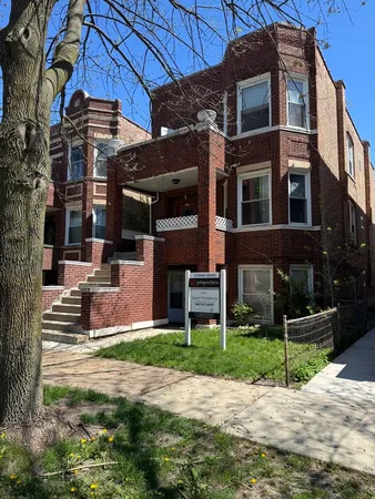 a house with garden in front of it