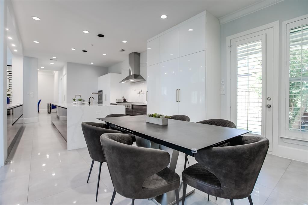 6319 Turner Way Dallas, TX 75230 - Photo 11 of 36 a view of a dining room with furniture and window