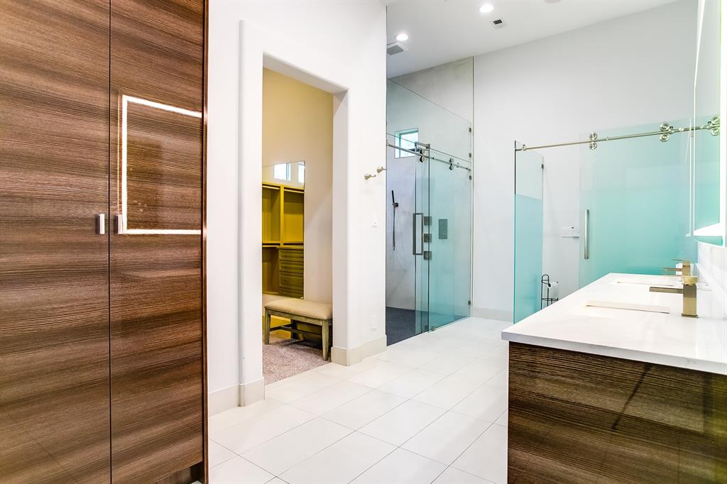 6319 Turner Way Dallas, TX 75230 - Photo 17 of 36 a bathroom with a sink and a mirror