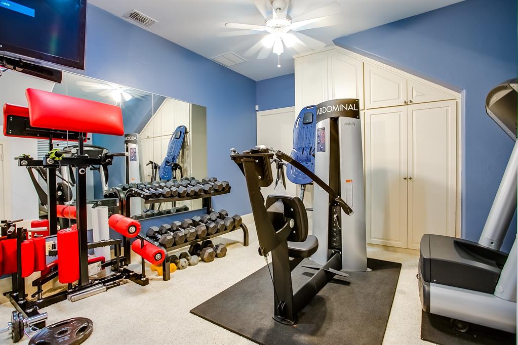 6319 Turner Way Dallas, TX 75230 - Photo 21 of 36 a view of a room with gym equipment