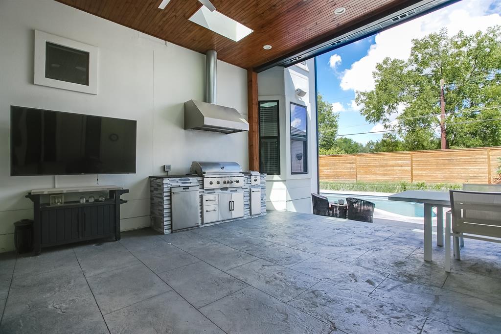 6319 Turner Way Dallas, TX 75230 - Photo 25 of 36 a large white kitchen with a large window