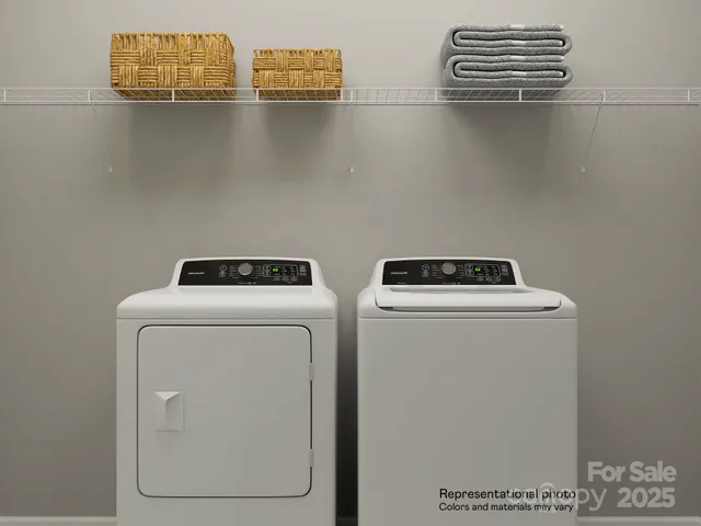 a living room with furniture and white walls