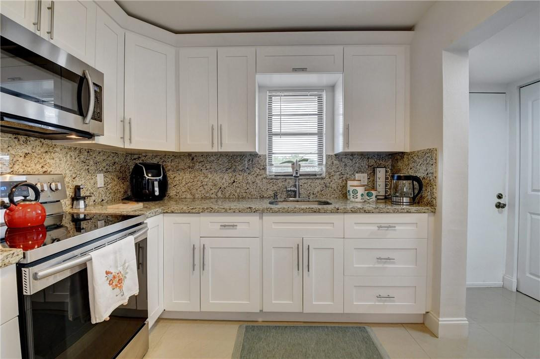 9273 Southwest 8th Street, Unit 407 Boca Raton, FL 33428 - Photo 7 of 38 Photo 7