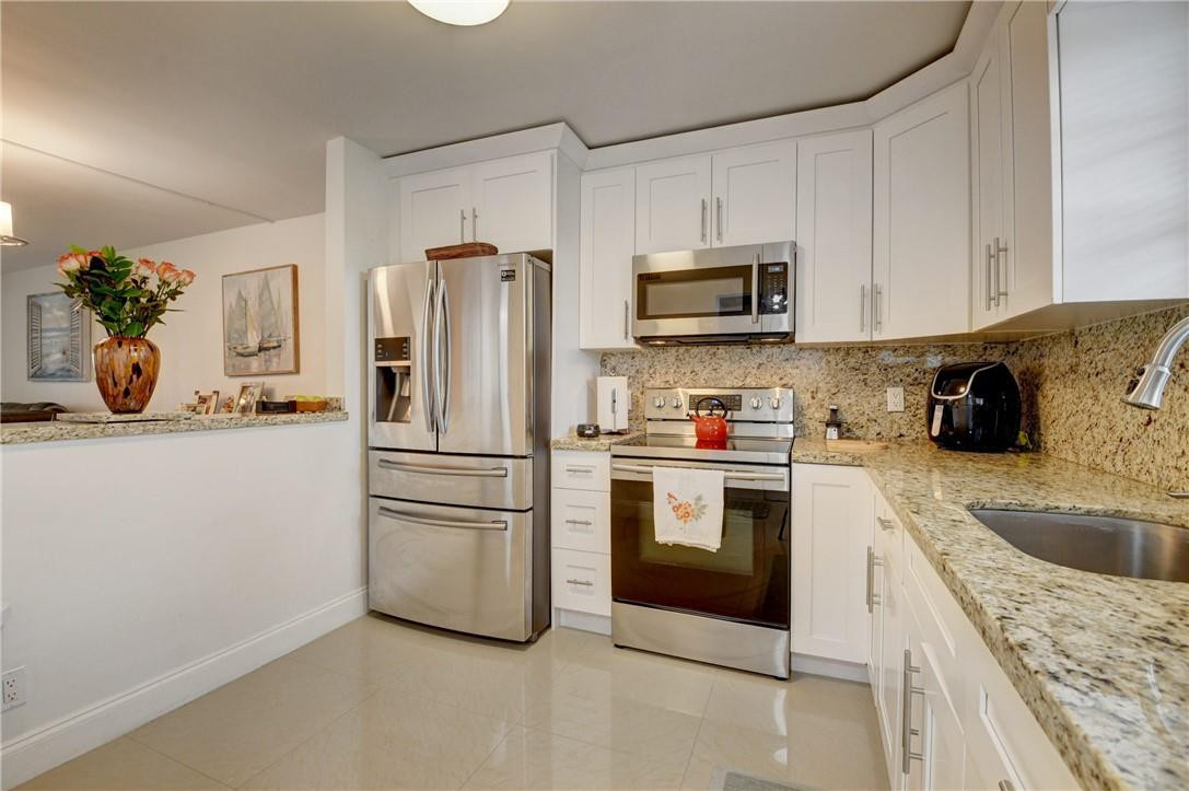 9273 Southwest 8th Street, Unit 407 Boca Raton, FL 33428 - Photo 8 of 38 Photo 8