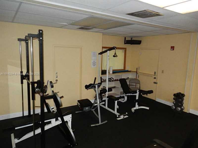 1720 Harrison Street, Unit 10G Hollywood, FL 33020 - Photo 20 of 20 a view of a room with gym equipment