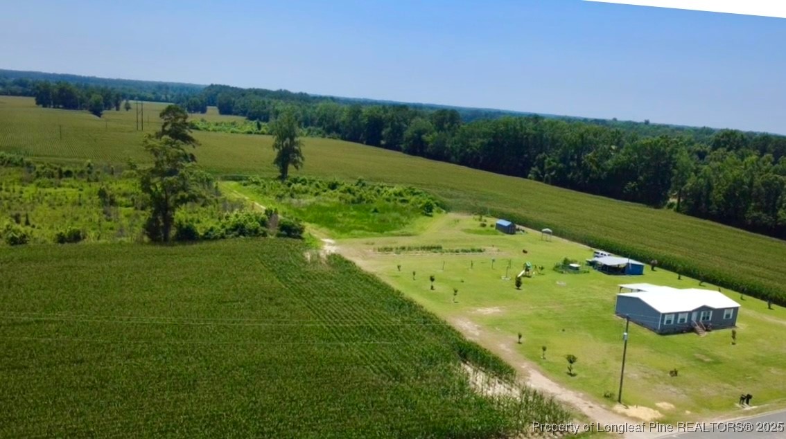 Rowan Road Lumberton, NC 28358 - Photo 8 of 14 a view of a lake with a yard