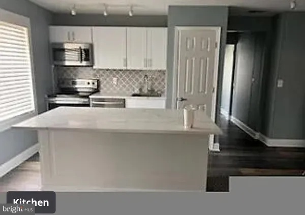 $1,900 | 5230 Breezy Point Road, Unit 202, Chesapeake Beach, MD 20732