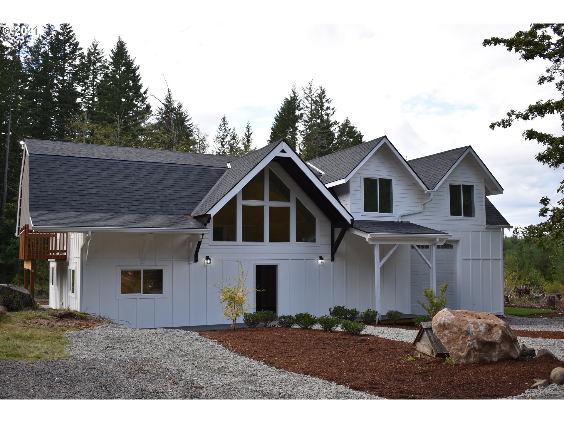 23243 South Bonney Road Colton, OR 97017 - Photo 2 of 32 a front view of a house with a yard