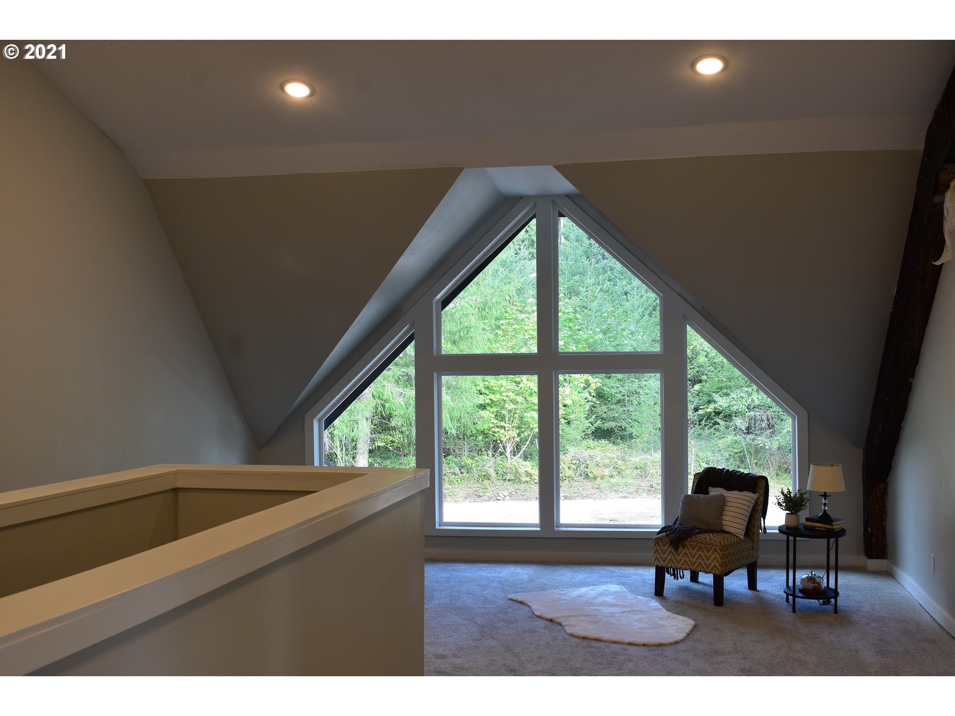 23243 South Bonney Road Colton, OR 97017 - Photo 11 of 32 a living room with furniture and large windows