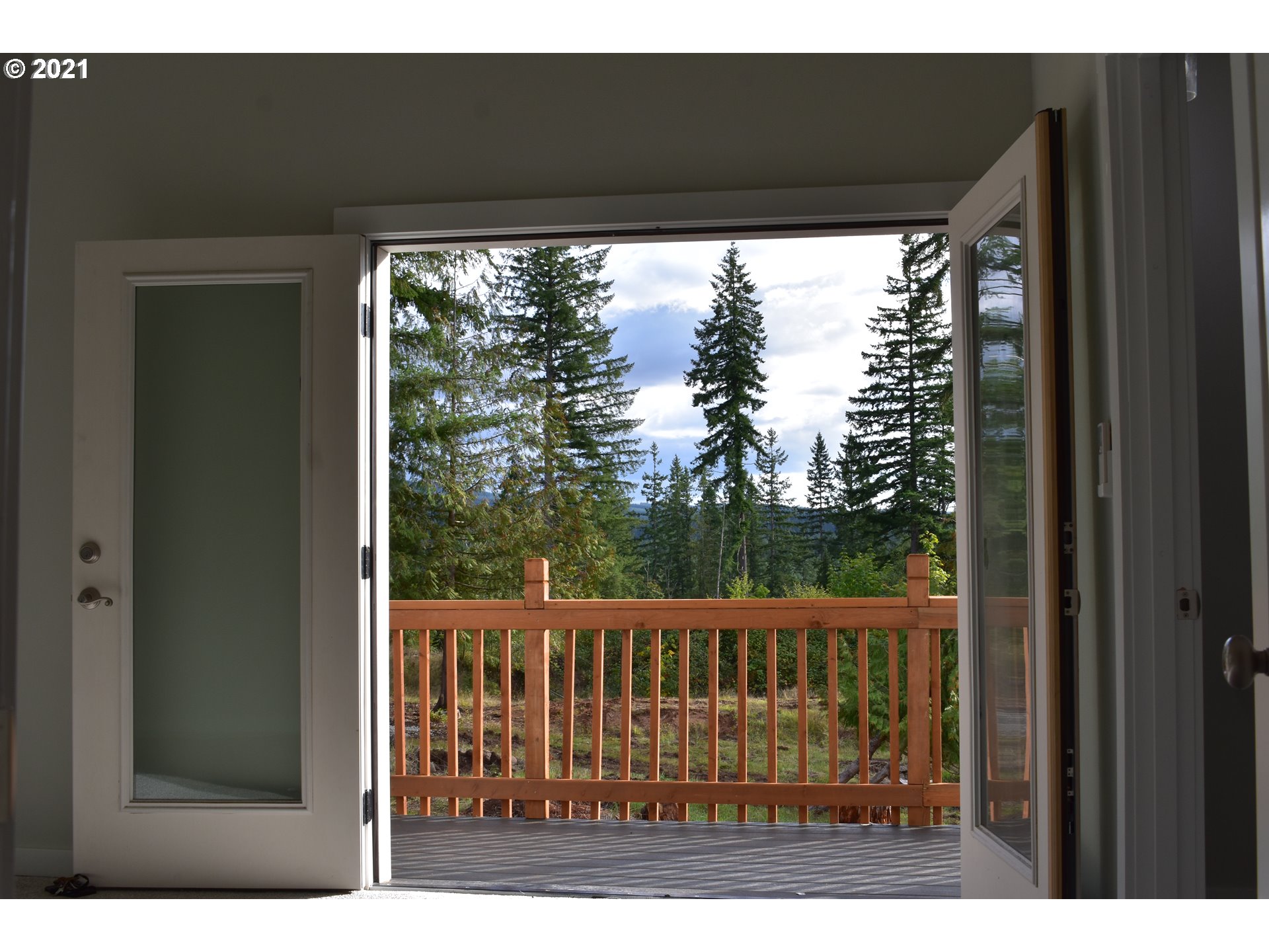23243 South Bonney Road Colton, OR 97017 - Photo 14 of 32 a view of a balcony with a swing
