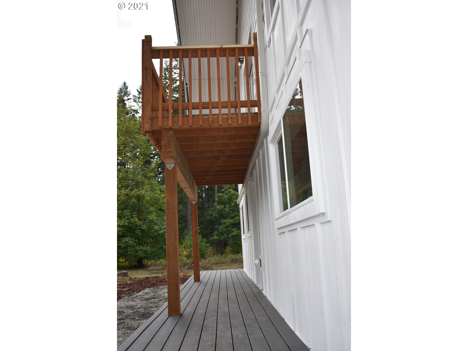 23243 South Bonney Road Colton, OR 97017 - Photo 28 of 32 a view of balcony with wooden floor