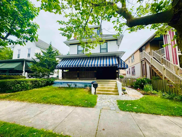 a view of a house with a swimming pool