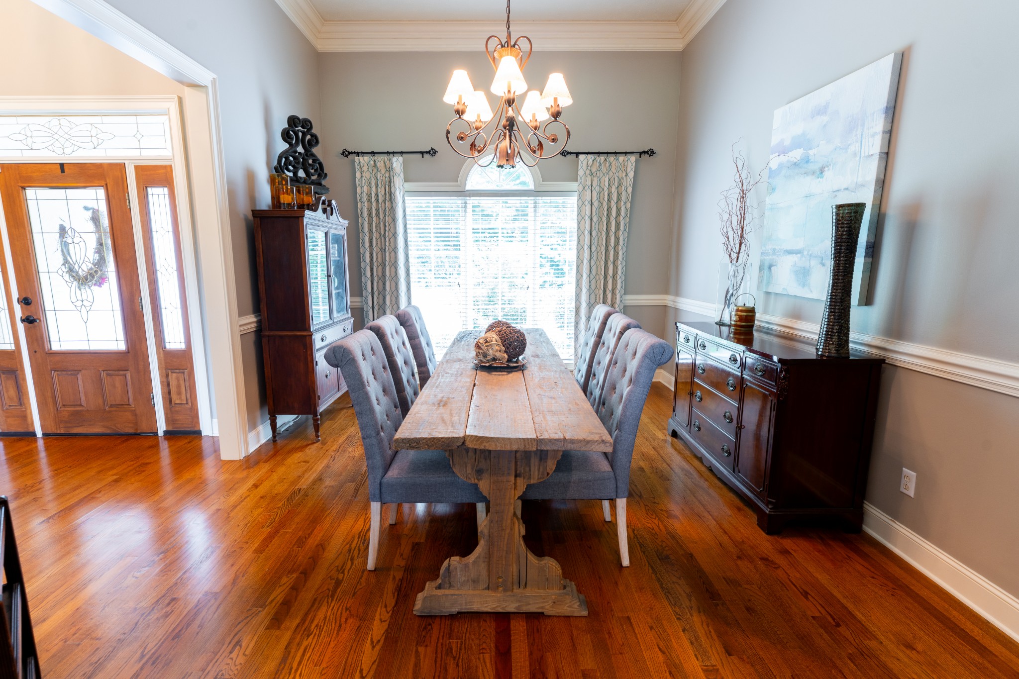 1015 Kelly Road Dyersburg, TN 38024 - Photo 12 of 41 a view of a dining room with furniture window and wooden floor
