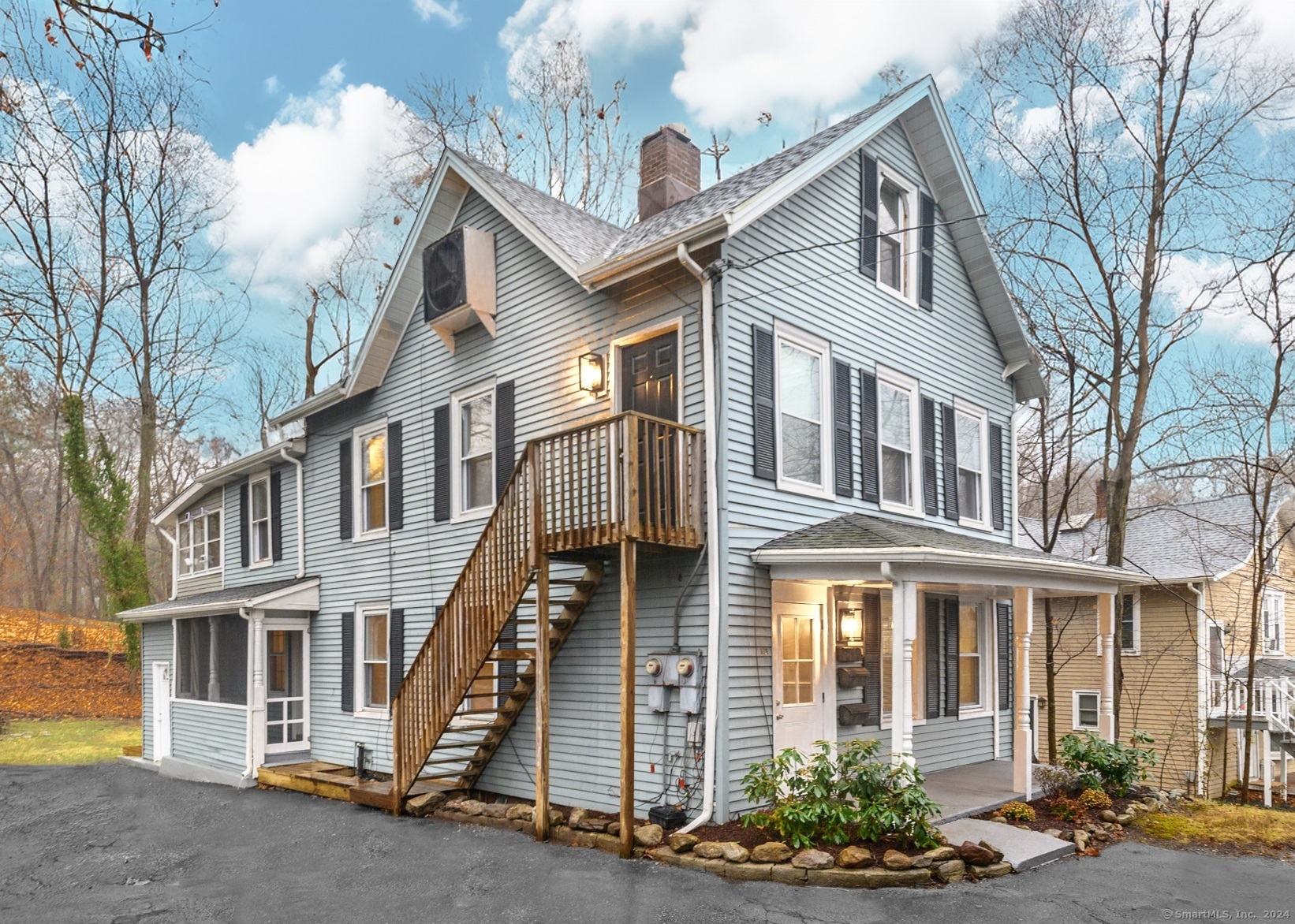 115 Wilton Road Westport, CT 06880 - Photo 1 of 1 a front view of a multi story residential apartment building