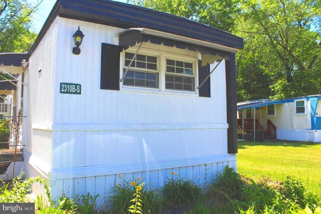 1762 Crown Point Road, Unit 2310B West Deptford, NJ 08086 - Photo 29 of 39 a view of a house with a yard
