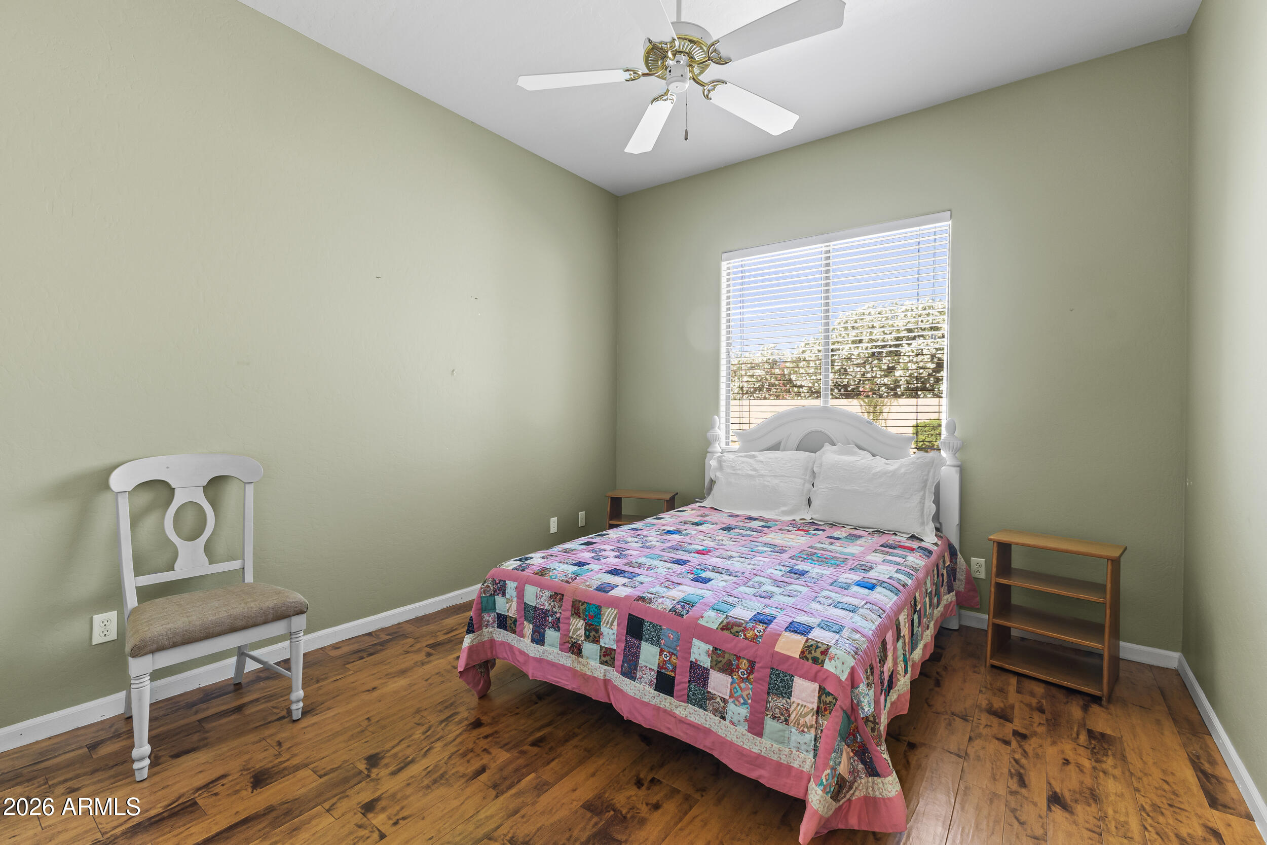 584 South Granite Street Gilbert, AZ 85296 - Photo 16 of 49 a bedroom with a bed and a window