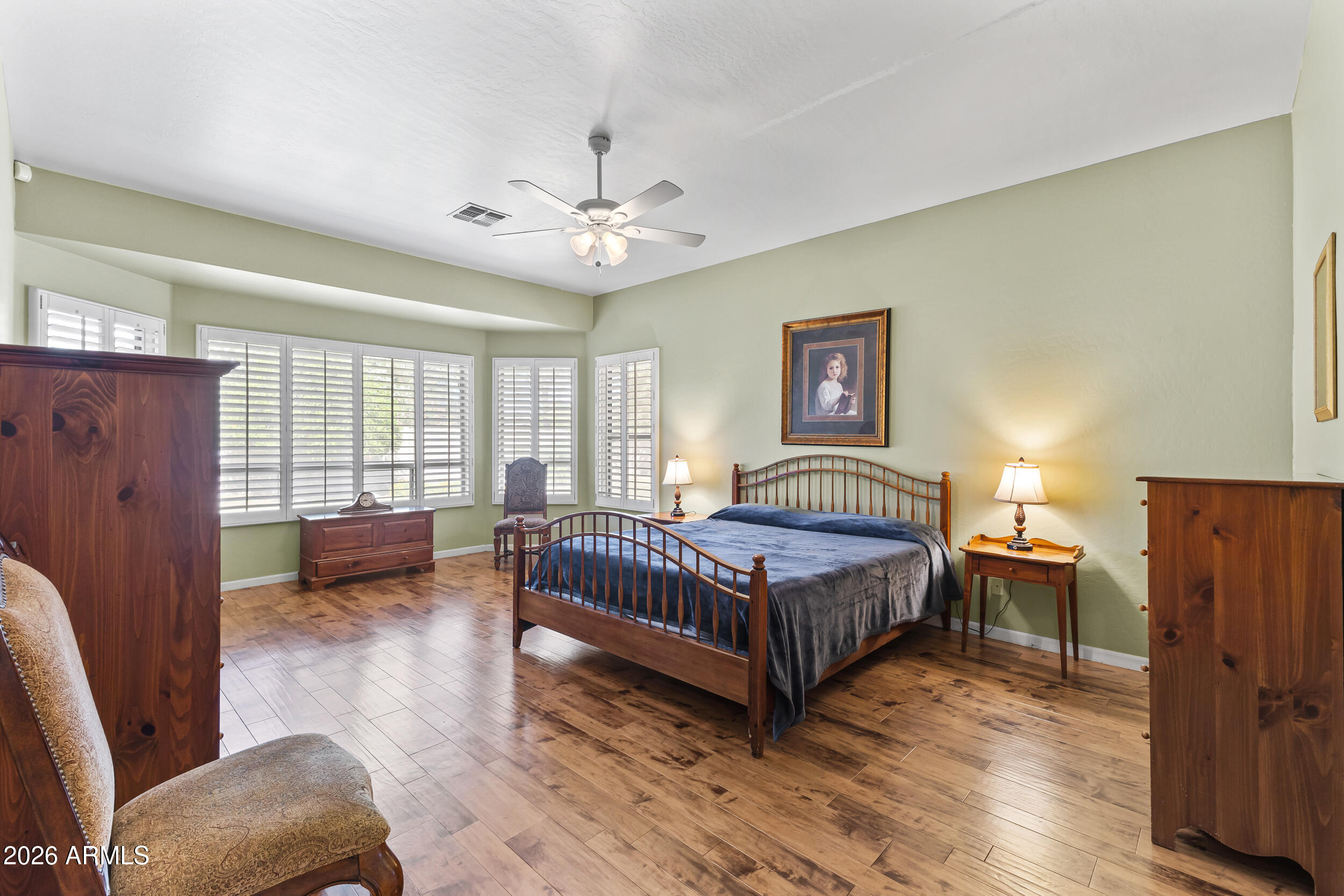 584 South Granite Street Gilbert, AZ 85296 - Photo 28 of 49 a spacious bedroom with a bed and a large window