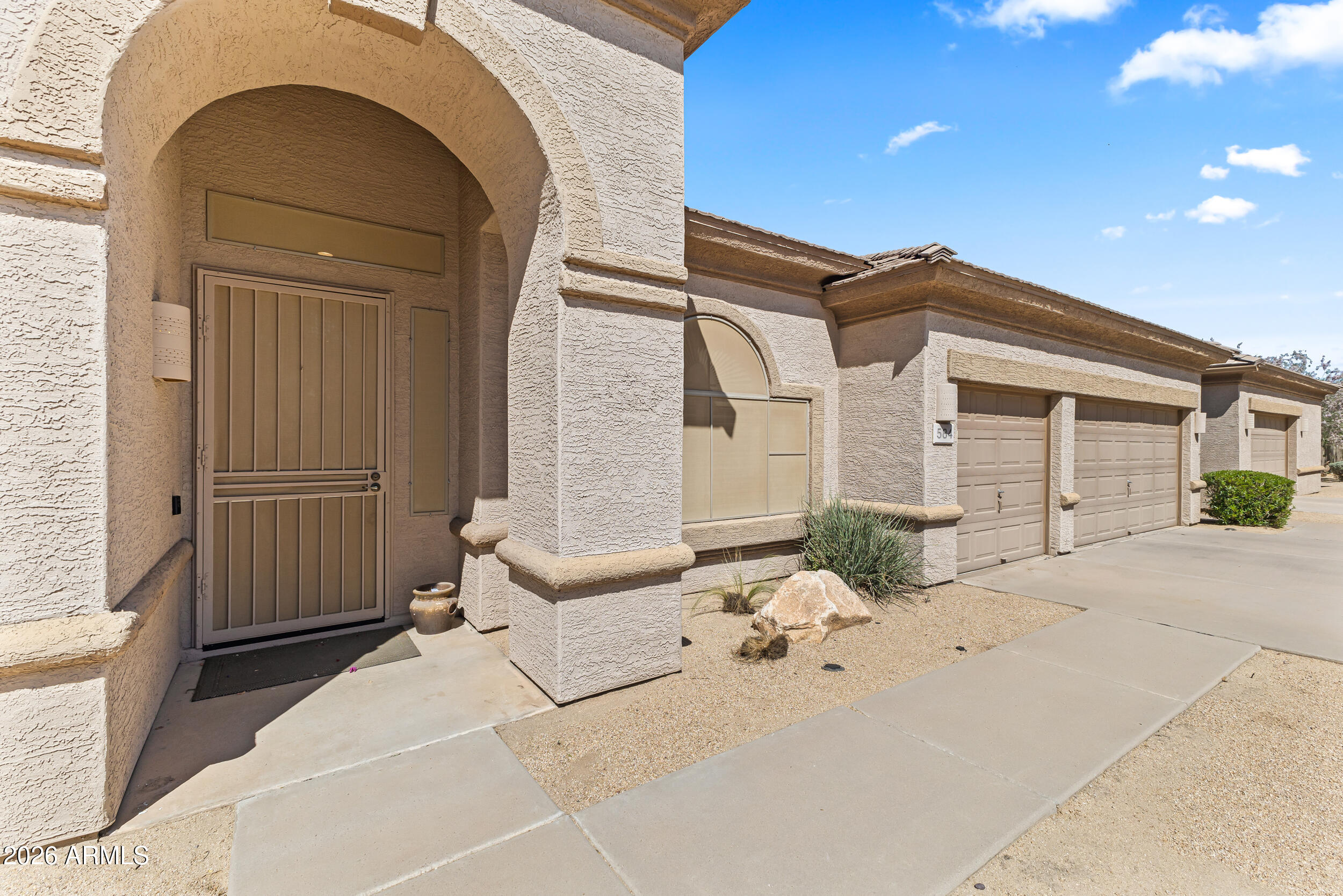 584 South Granite Street Gilbert, AZ 85296 - Photo 6 of 49 a view of white house with a outdoor space