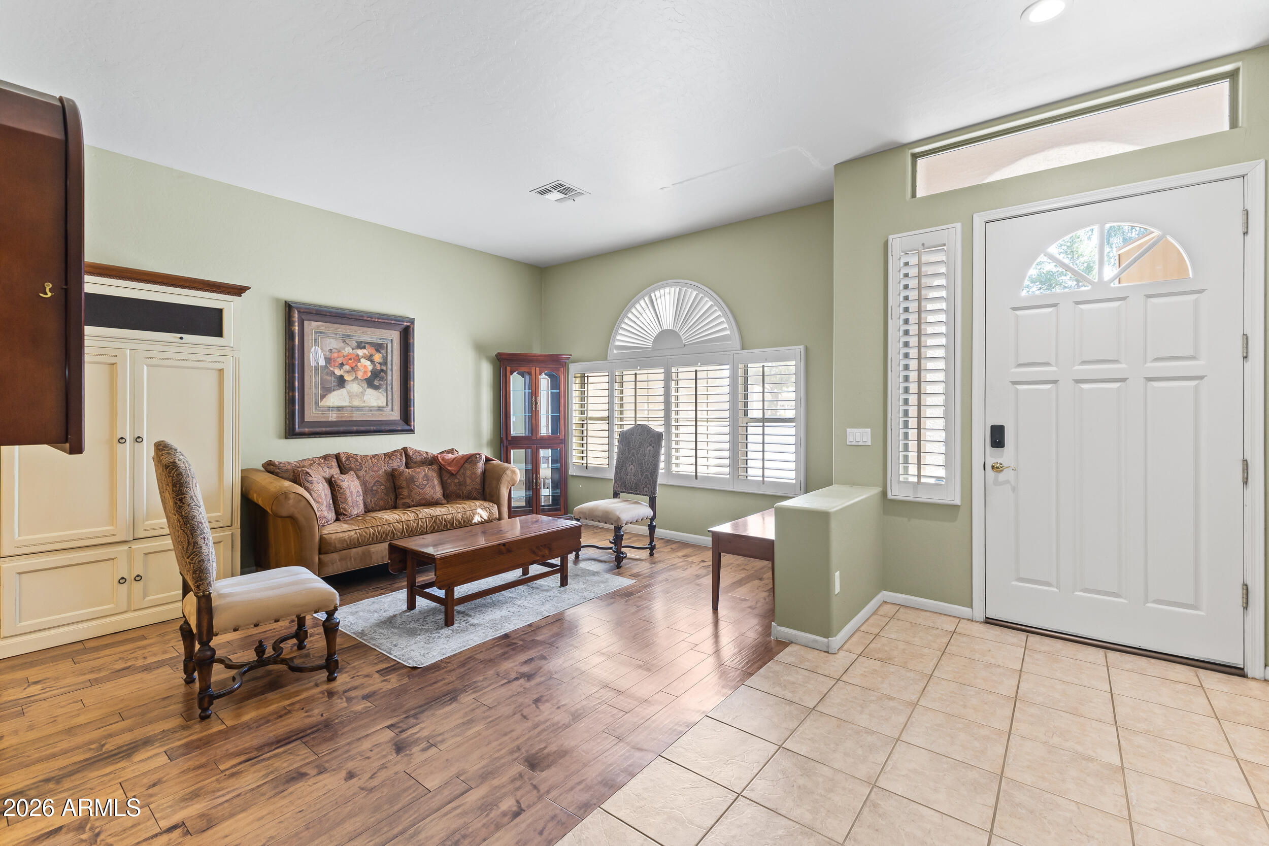 584 South Granite Street Gilbert, AZ 85296 - Photo 8 of 49 a living room with furniture and a large window