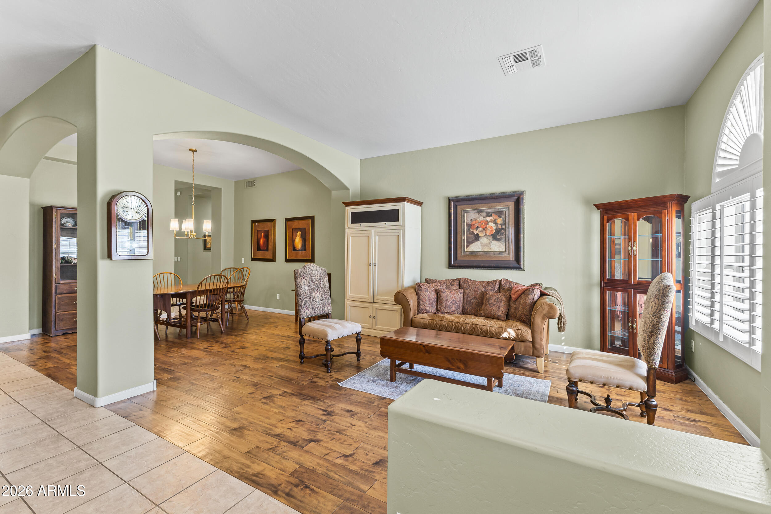 584 South Granite Street Gilbert, AZ 85296 - Photo 9 of 49 a living room with furniture and a large window