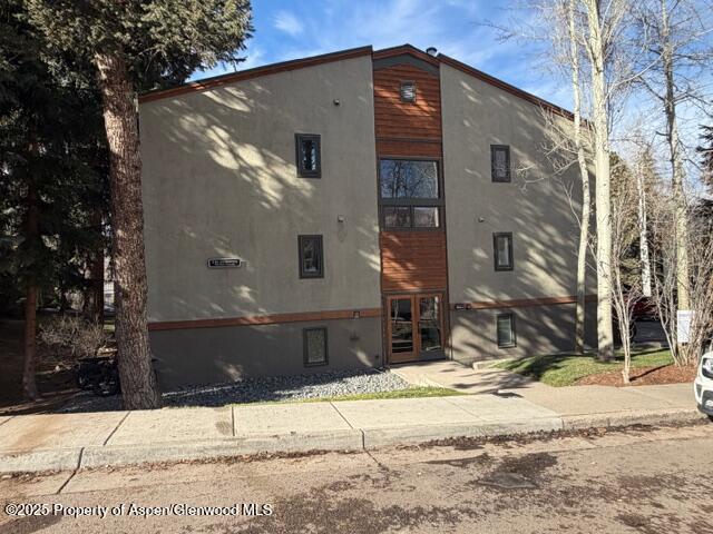 910 West Hallam Street, Unit 12 Aspen, CO 81611 - Photo 28 of 28 a front view of a house