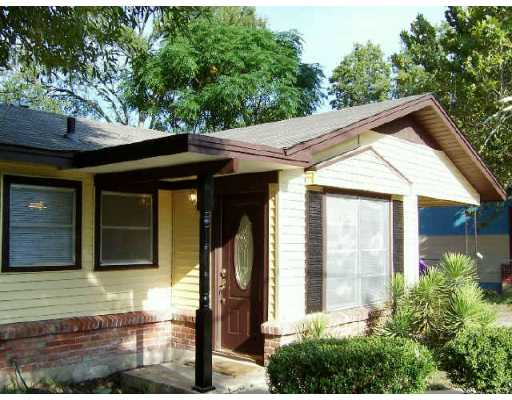 5218 Overbrook Drive Austin, TX 78723 - Photo 1 of 1 a front view of a house with a yard