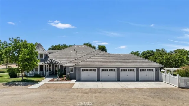 a kitchen with stainless steel appliances granite countertop a stove oven and a refrigerator