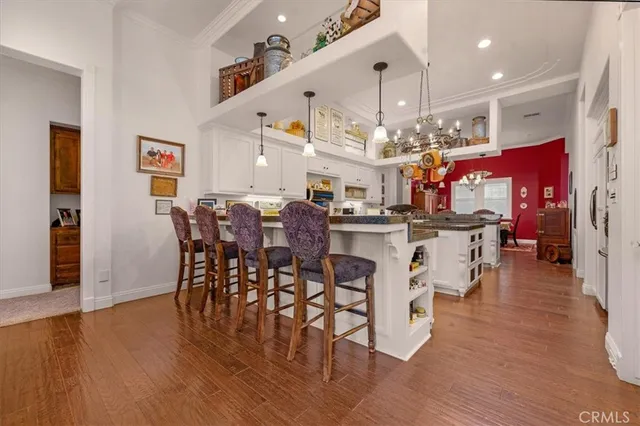 a view of a dining room with furniture and window