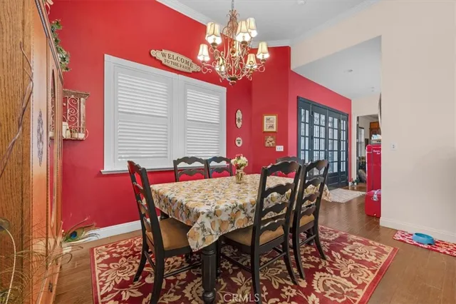 a kitchen with stainless steel appliances granite countertop a stove sink and cabinets