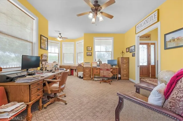 a bathroom with a double vanity sink and a mirror with bathtub