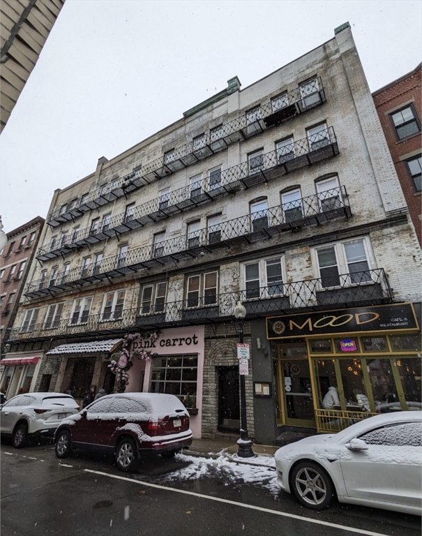 a car parked in front of a building