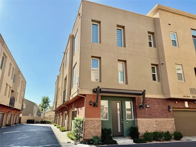 a front view of a multi story residential apartment building