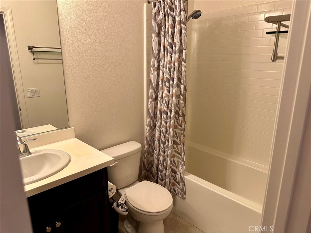 422 West Rte 66, Unit 87 Glendora, CA 91740 - Photo 22 of 35 a white toilet sitting next to a bath tub