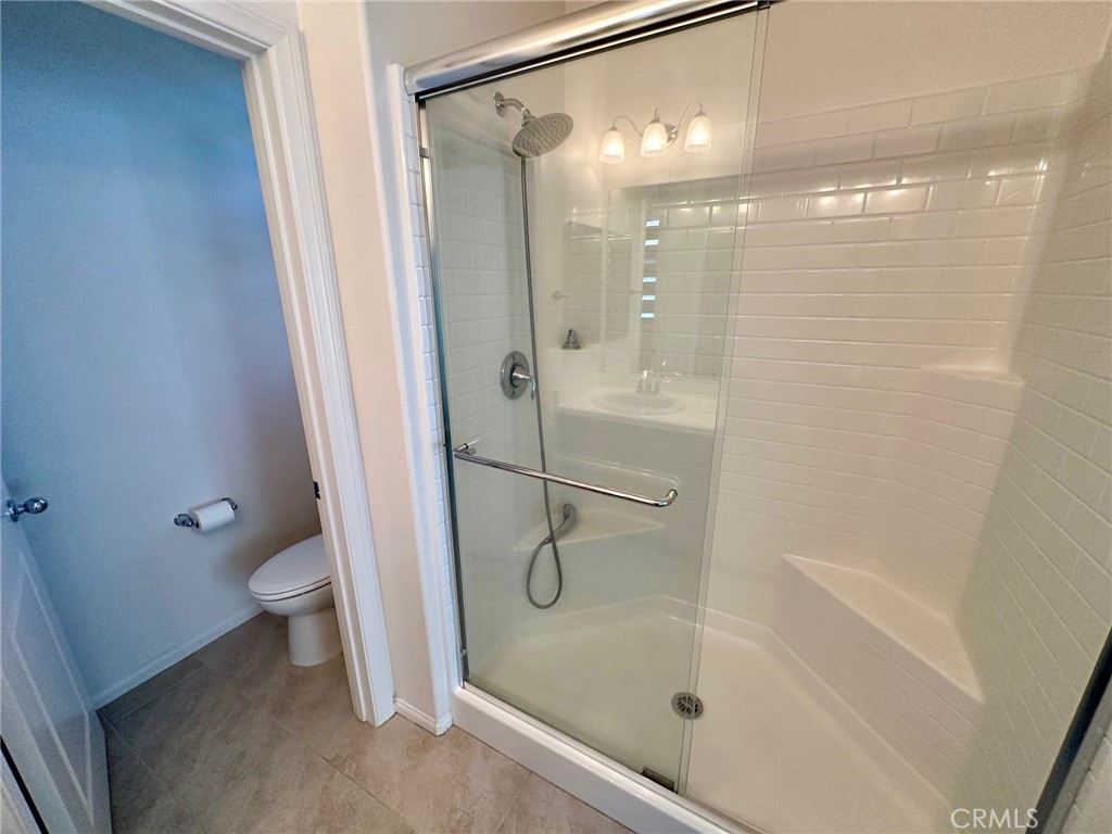 422 West Rte 66, Unit 87 Glendora, CA 91740 - Photo 28 of 35 a bathroom with a shower