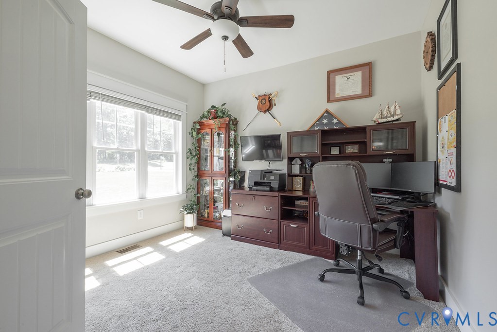 6446 Chestnut Church Road Mechanicsville, VA 23116 - Photo 9 of 49 Spacious room featuring light-toned carpeting and